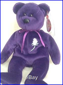 purple ty bear with white rose