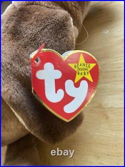 Authentic TY Beanie Baby WISE the owl class of'98. Retired. Rare. Tag errors