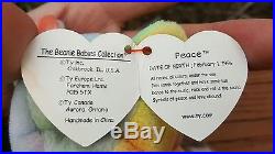 Rare 1996 peace bear beanie baby with tag error and key chain